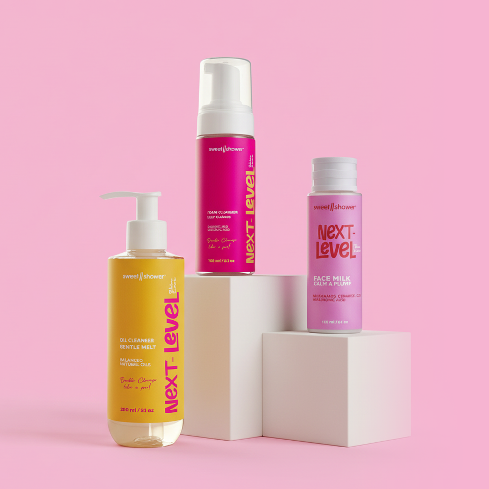 Three bottles of 'Next Level' skincare products from Sweetnshower  on a pink background
